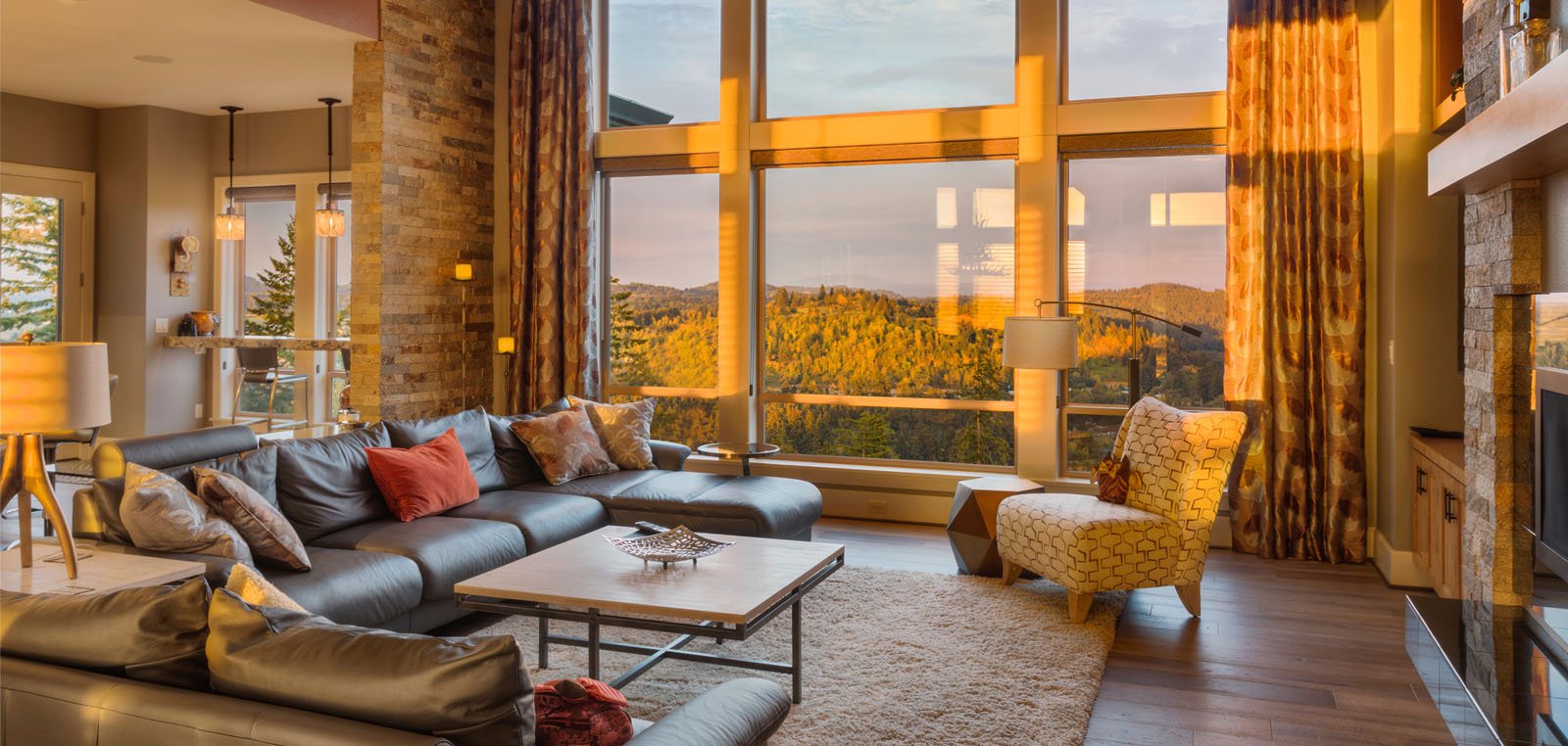 Living Room with Leather Sofa and Forest View