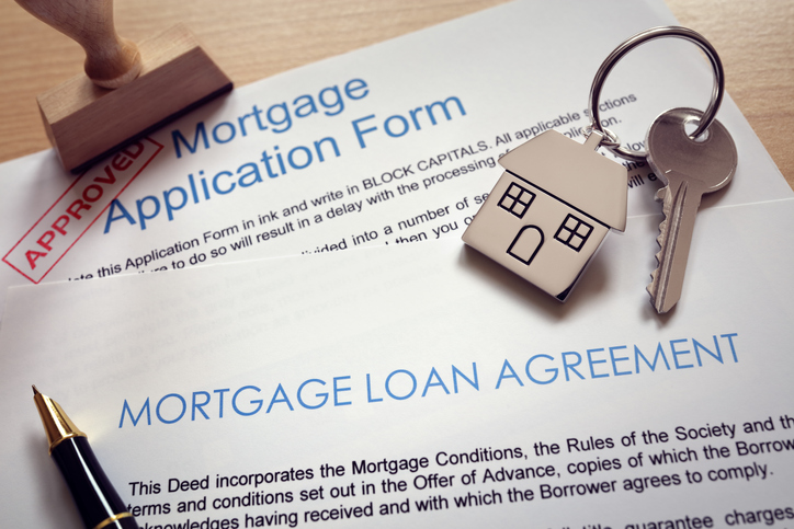 Stamped and Approved Forms of Mortgage Application Along With the House Key