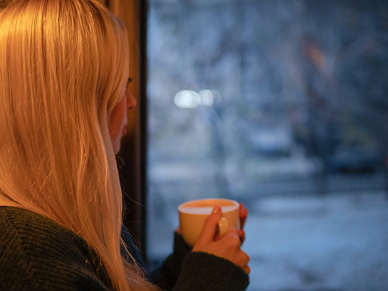 woman drinking coffee